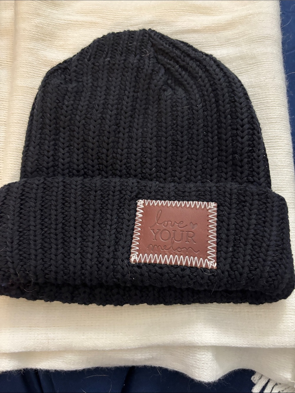 Love Your Melon Black Knit Beanie with Brown Leather Patch